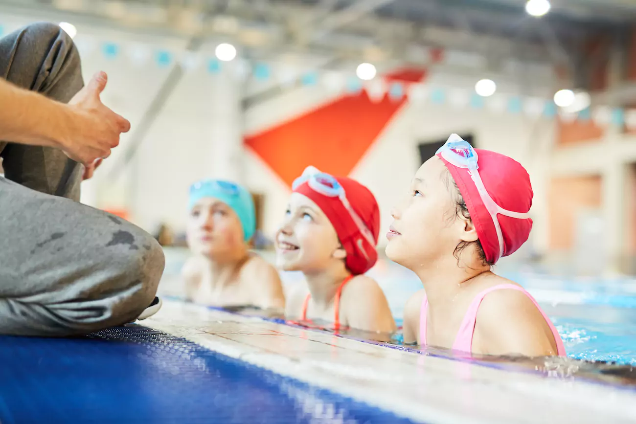 Child practising swimming near Cannock